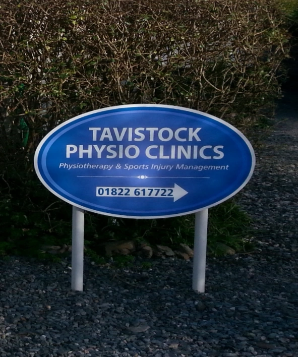 Post and Contour Panel Sign in use
